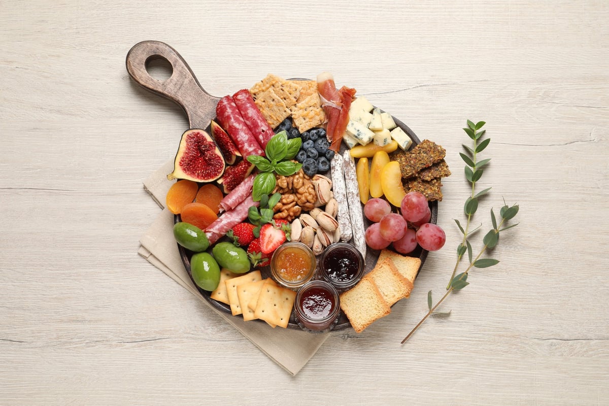 A table of small appetizers arranged on wood